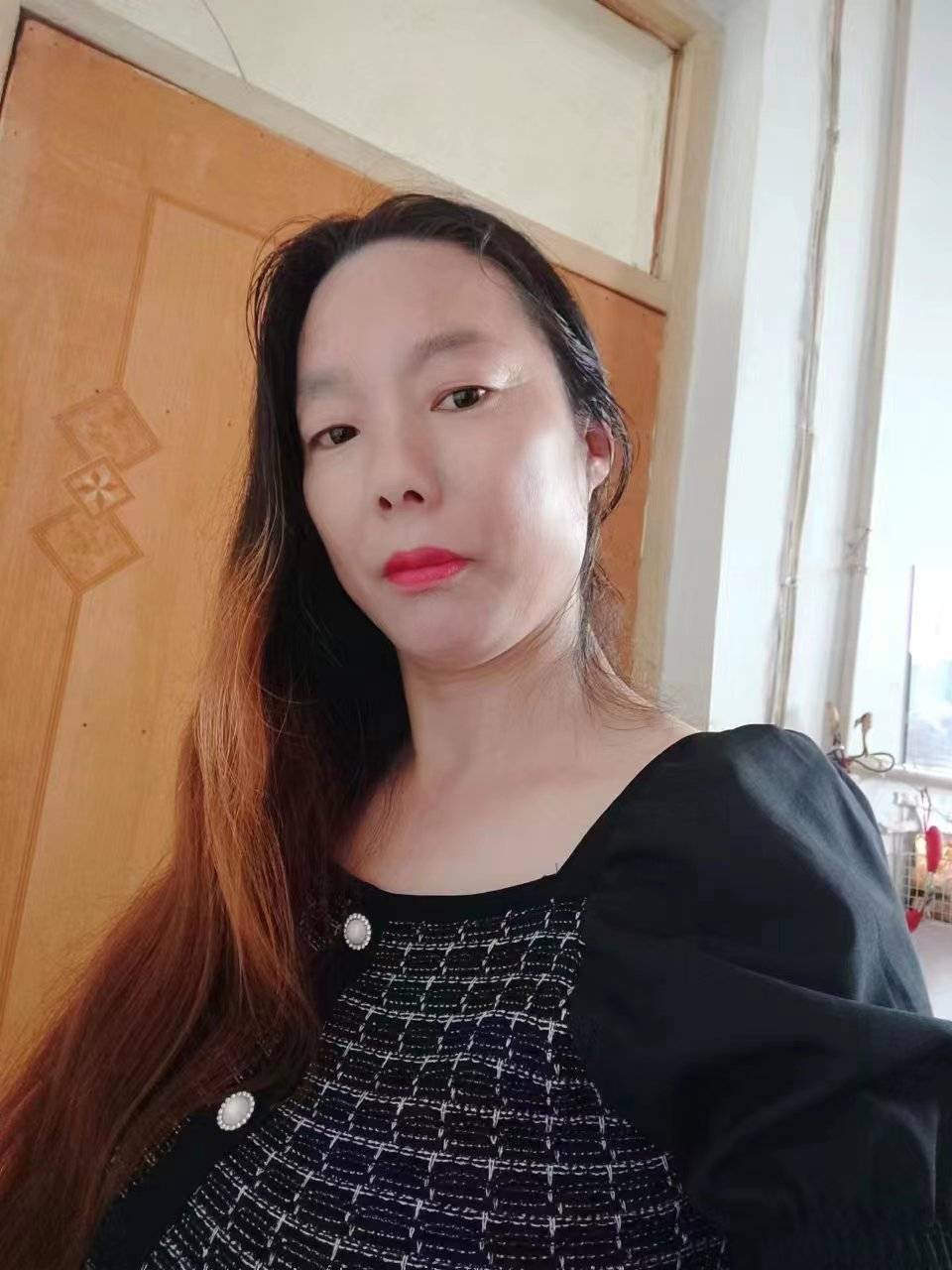班女士